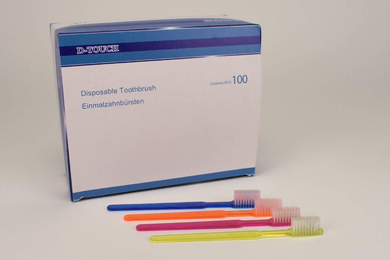 Engångstandborste D-Touch med tandkräm blandade färger 100st.